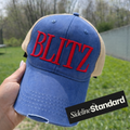 Blitz Puff Embroidered Trucker Hat (Blue/Red)